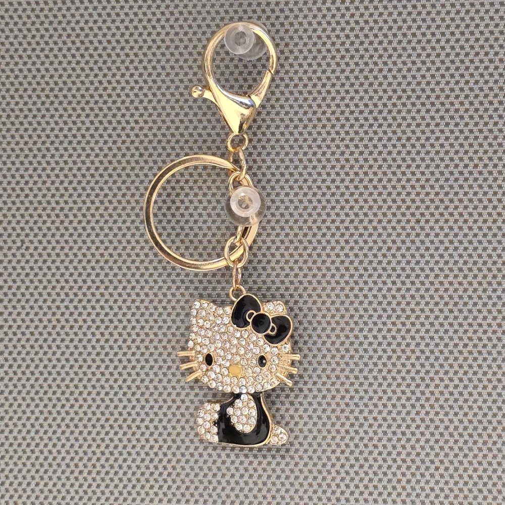 Sanrio Hello Kitty Rhinestone Keychain Gold Tone Black Bow Bag Charm Accessory